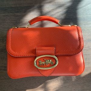 Coach Riley 22 top handle Mango